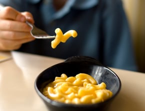 kid eating mac-n-cheese